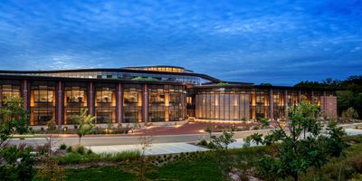 Exterior shot of the Kornberg Center at dusk.