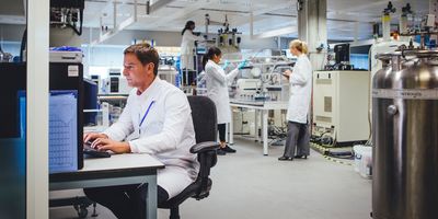 Group of medical science professionals working in a laboratory