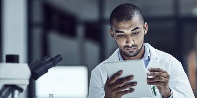 Scientist uses a tablet