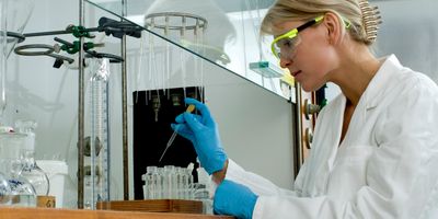 Woman at work in lab stock photo