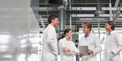 Scientists discuss a lab renovation