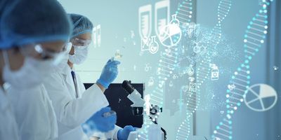 Two scientists in PPE examining samples in the lab with DNA strands overlaying the image