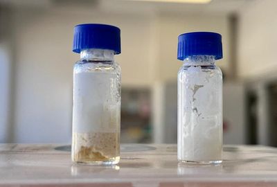 Image of two vials showing a commercial organic shampoo stored for 30 days yellowed and separates (left) while the same shampoo spun in a vortex fluidic device maintains its color and texture (right).