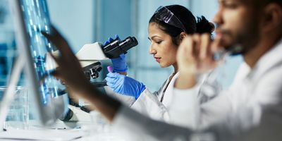 Two researchers working in a lab together