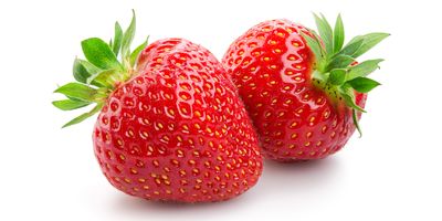 Two strawberries on a white background