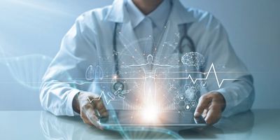 a futuristic holographic display showing a human body and various health metrics is projected above a tablet held by a male doctor in a white lab coat sitting at a glass table