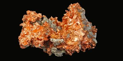 Large chunk of copper on a black background