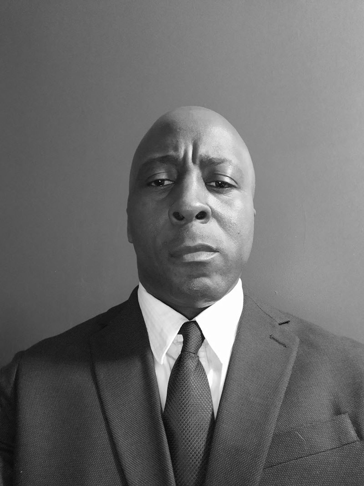 Black and white headshot image of Dwayne Henry