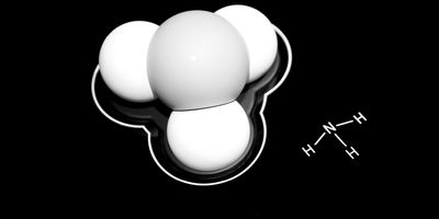 computer image of ammonia molecule on black table