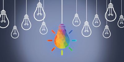 illustration showing multiple white line art lightbulbs hanging down with one brightly multicolored lightbulb in the center