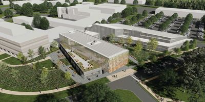 rendering of an aerial view of a research building surrounded by greenery