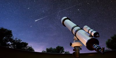 Telescope pointed at the night sky