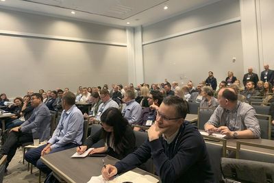 View of conference room full of people during a presentation at the Lab Design Conference