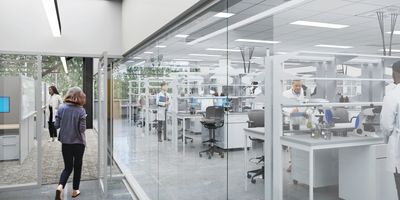 A glass-walled laboratory next to a hallway