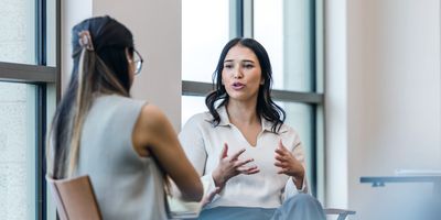 Two colleagues have a candid discussion