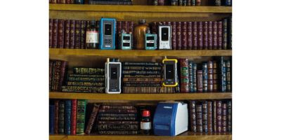 Raman analyzers on a book shelf with books