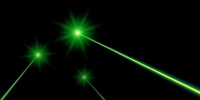 Three green lasers on a black background