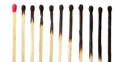 Series of burnt matches on a white background