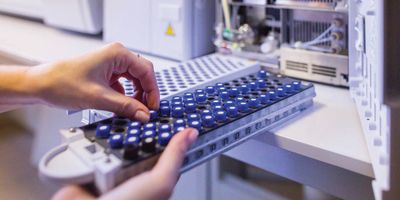 Scientist uses a chromatograph