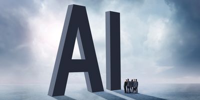 People in the shadow of the letters "AI"