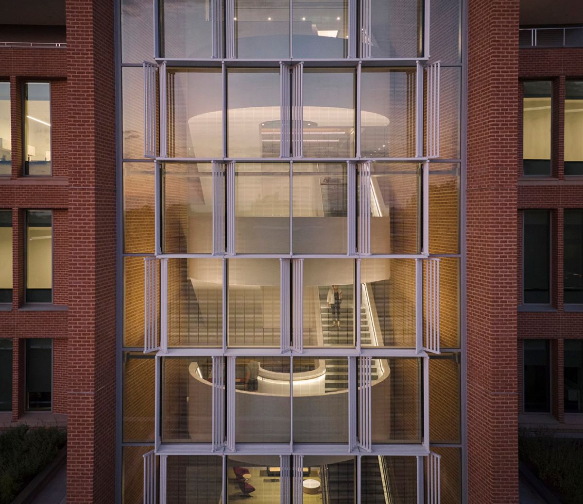 A side view of the glass walls looking into the stairwell at Ralph S. O'Connor Engineering and Science Building