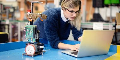 Woman engineer working at her laptop