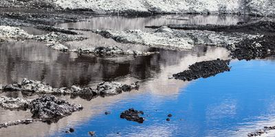 Coal ash leeching into a stream