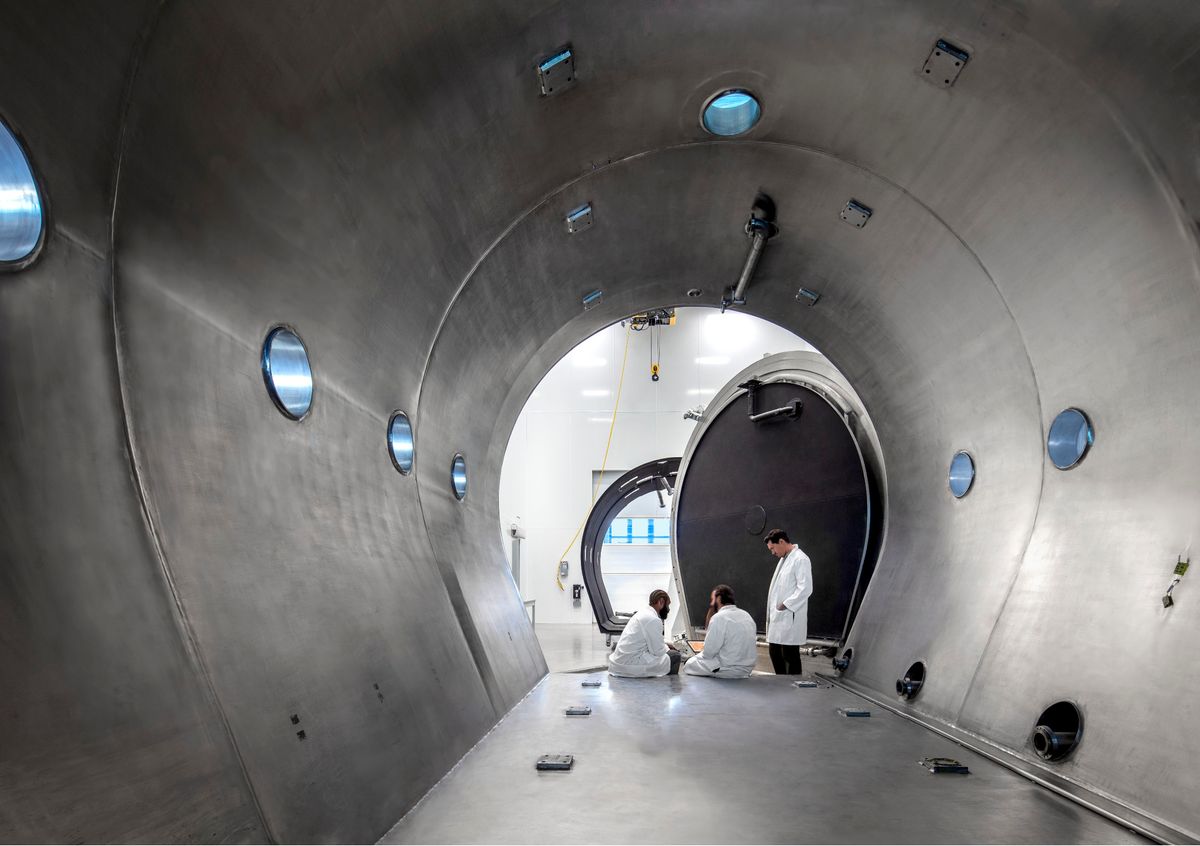 Scientists in U of Arizona thermal vacuum chamber