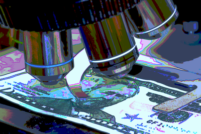 closeup of microscope examining dollar bill